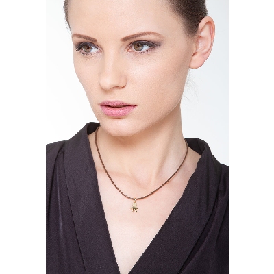 Pendentif en forme d’enfant en or jaune 18K