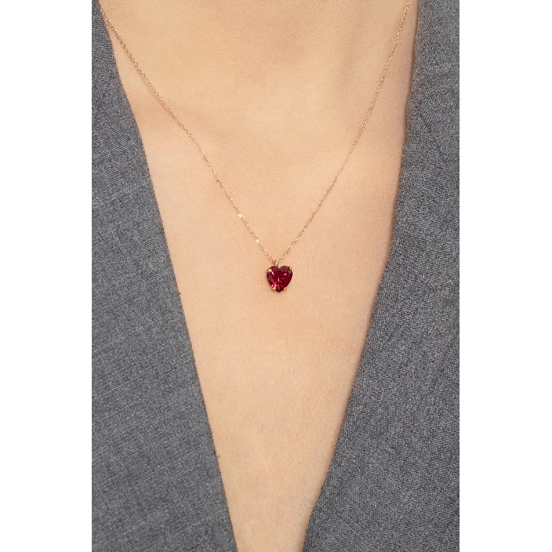 Collier en or rose 18k avec pendentif et zircon rouge Collier en or rose 18k avec pendentif et zircon rouge
