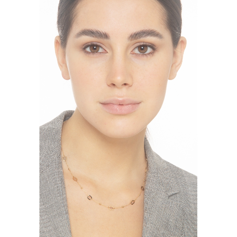 Collier en or jaune 18k avec perles et anneaux Collier en or jaune 18k avec perles et anneaux