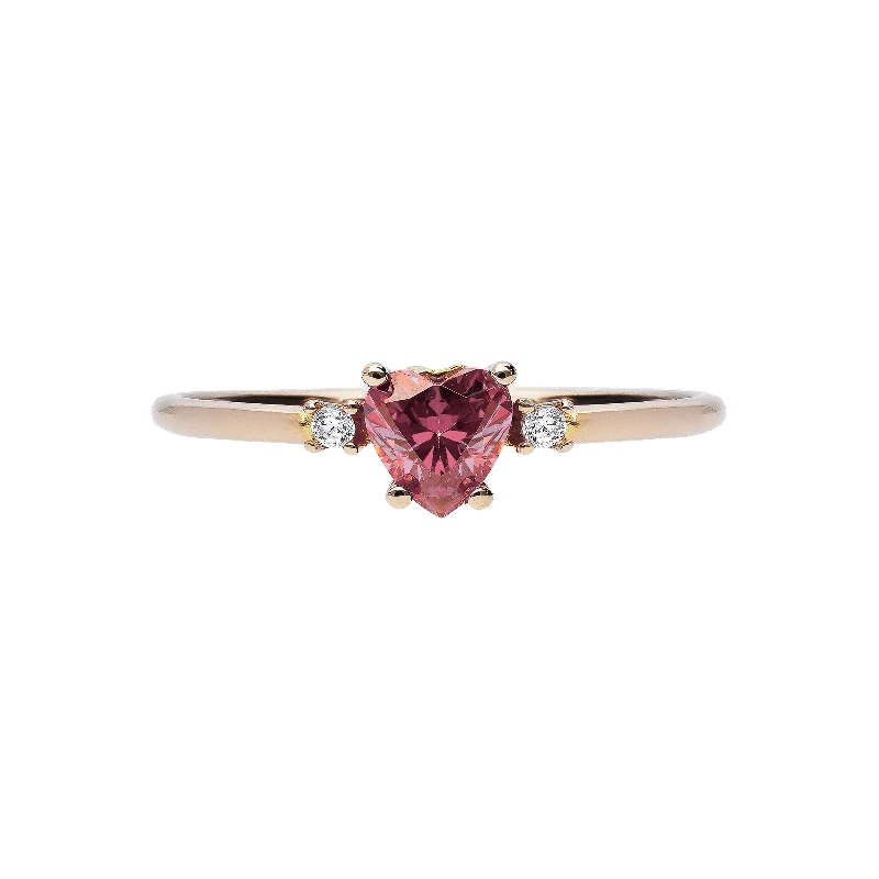 Bague en or rose 18k avec zircons Bague en or rose 18k avec zircons