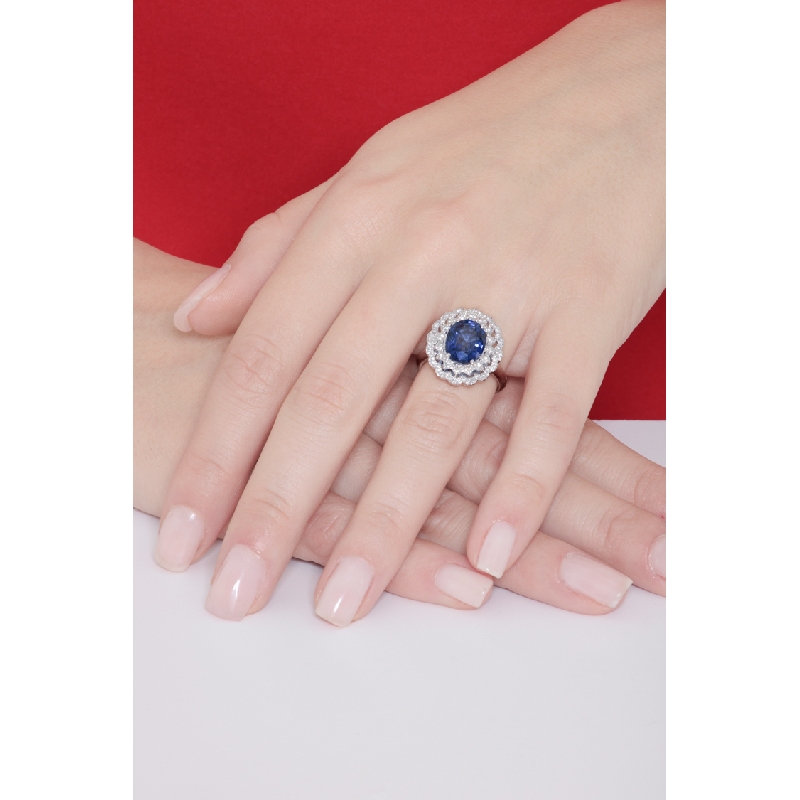 Bague halo double en or blanc 18k avec saphir bleu et diamants