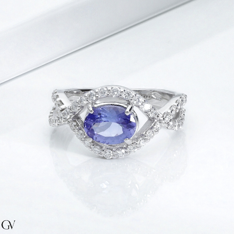 Bague or blanc 18k avec tanzanite et diamants entrelacés