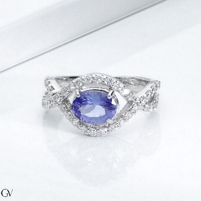 Bague or blanc 18k avec tanzanite et diamants entrelacés