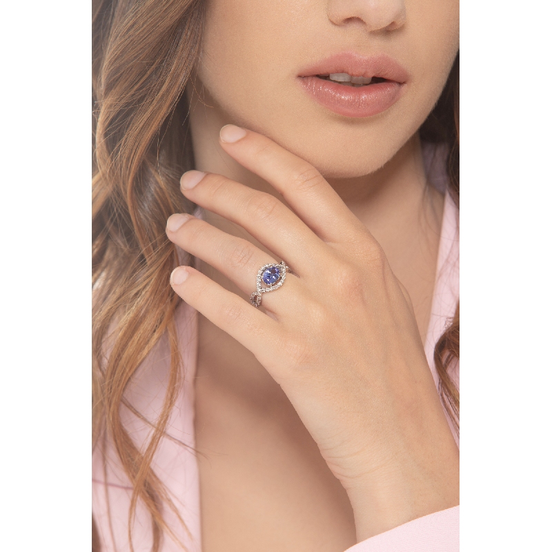 Bague or blanc 18k avec tanzanite et diamants entrelacés