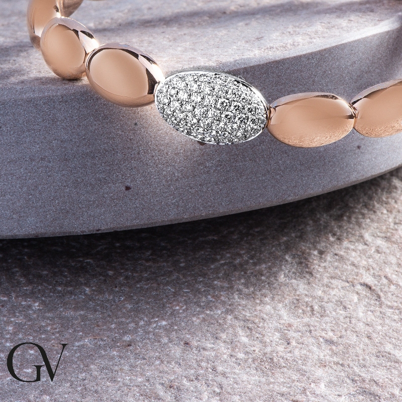 Bracelet ressort avec ovales en or blanc et rose 18k avec diamants