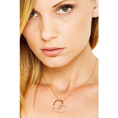 Collier coeur avec pendentif en or rose 18k et diamants