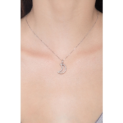 Collier pendentif en or 750 avec lune et diamants 