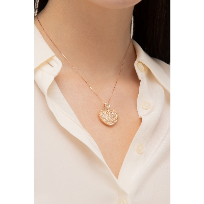Collier en or rose 18k avec pendentif coeur et diamants