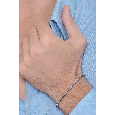 Bracelet tennis or blanc 18k avec saphirs bleus