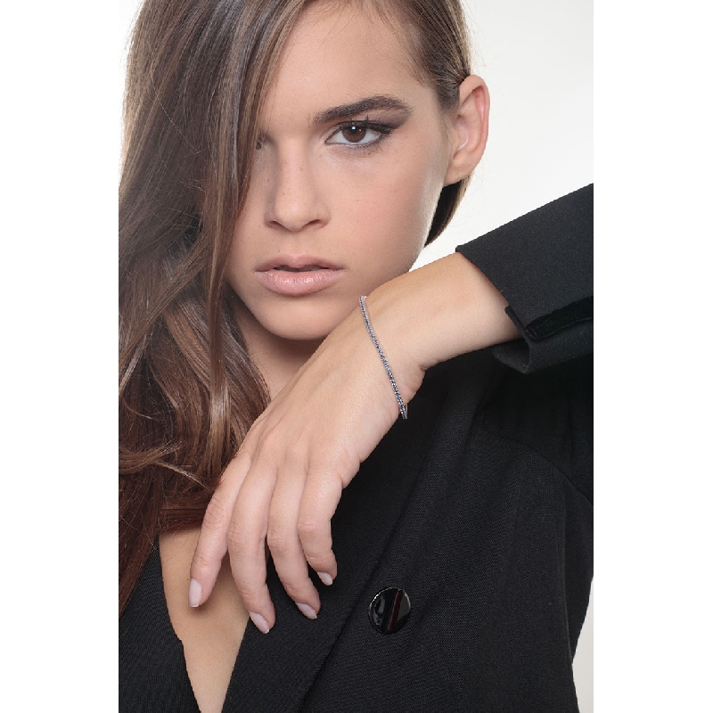 Bracelet tennis or blanc 18k avec saphirs bleus