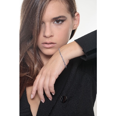 Bracelet tennis or blanc 18k avec saphirs bleus