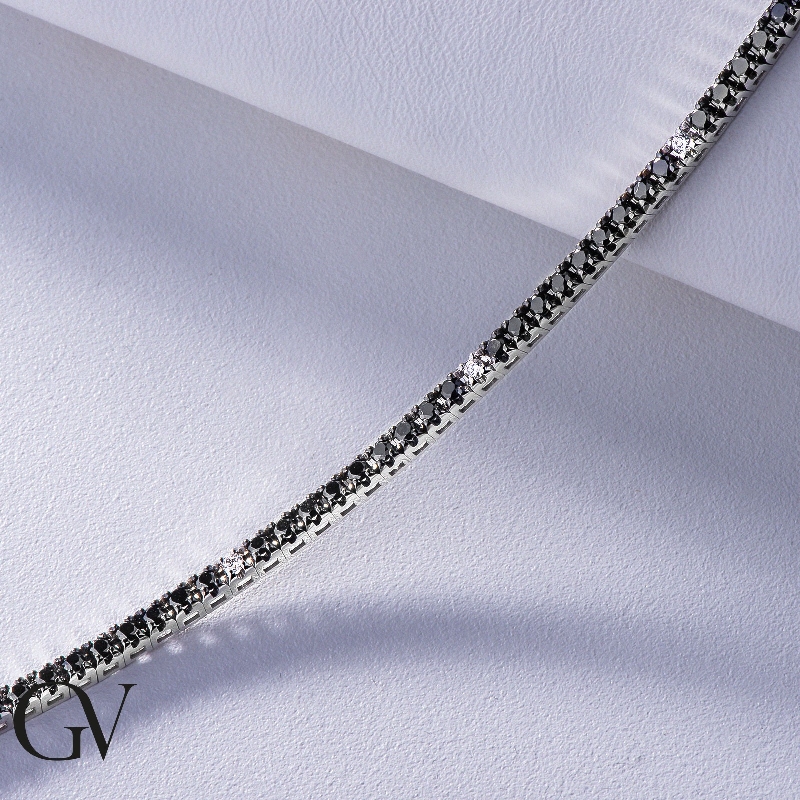 Bracelet tennis en or blanc 18 carats avec diamants noirs et blancs et griffes brunies