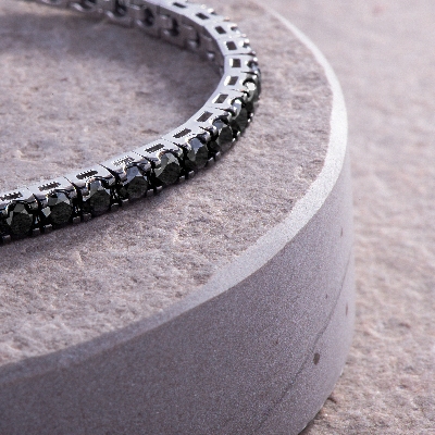 Bracelet tennis homme et femme en or blanc 750  diamants noirs