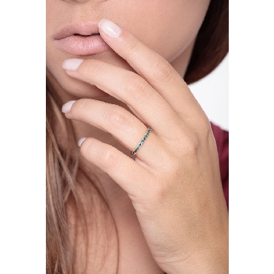 Bague Éternité griffes en or jaune 18k avec diamants bleus