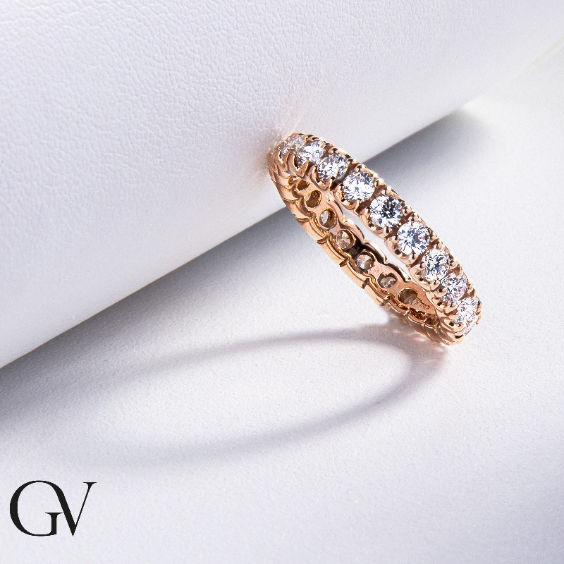 Bague d'éternité griffe en or rose et diamants Bague d'éternité griffe en or rose et diamants