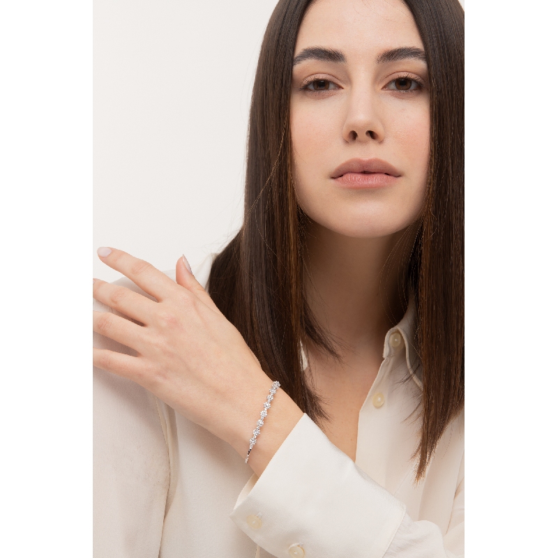 Bracelet semi-rigide avec fleurs et feuilles or 18kt diamants Bracelet semi-rigide avec fleurs et feuilles or 18kt diamants