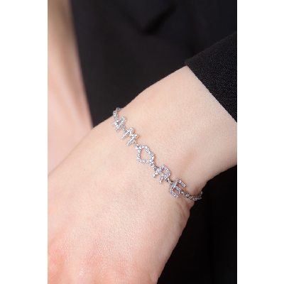 Bracelet personnalisé  AMORE  en or blanc 750 et diamants