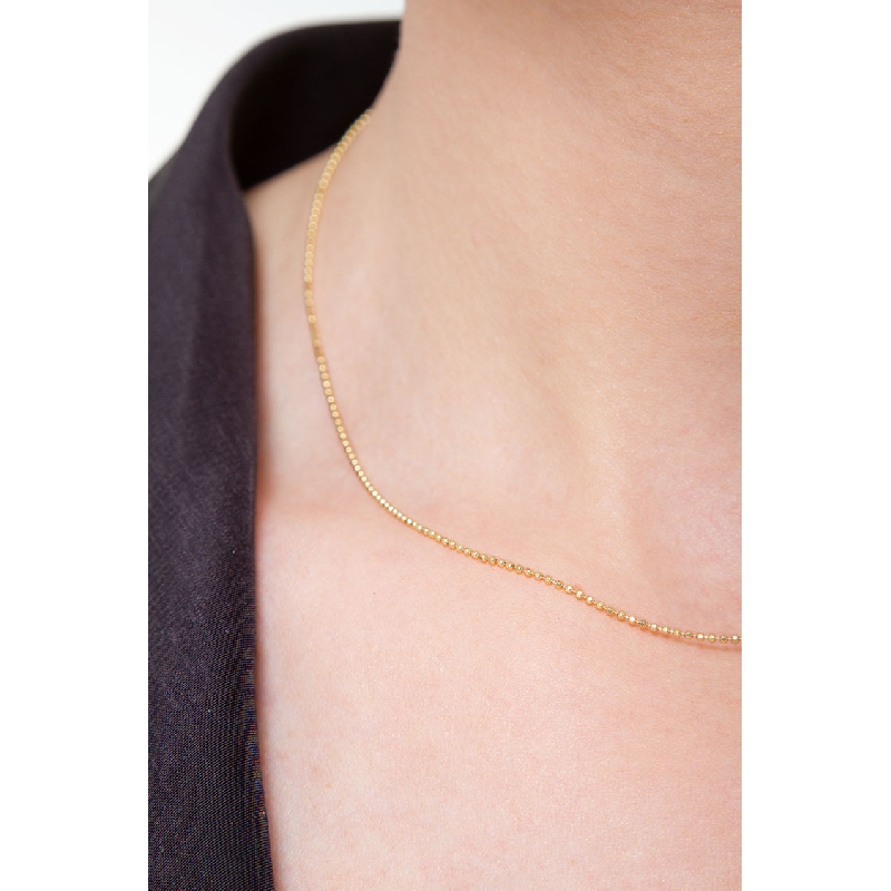 Collier avec de petites perles en or jaune 18 carats