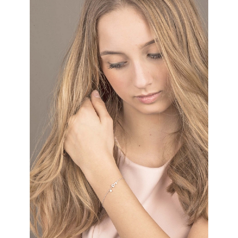 Bracelet avec clé en or blanc 18 carats et diamants Bracelet avec clé en or blanc 18 carats et diamants