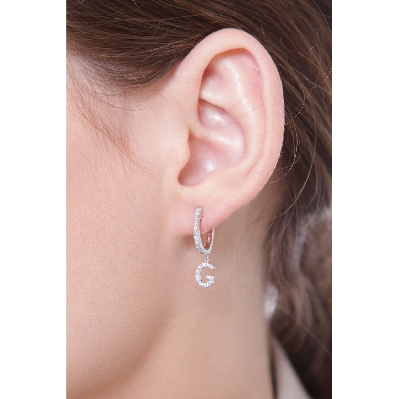 Mono boucle d'oreille en or blanc 18 carats, avec lettre G en diamants Mono boucle d'oreille en or blanc 18 carats, avec lettre G en diamants
