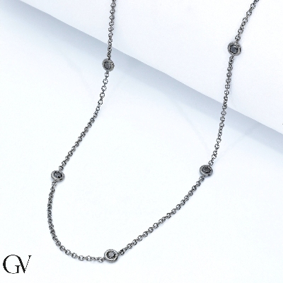 Collier en or bruni 18k sublimé par 9 diamants noirs