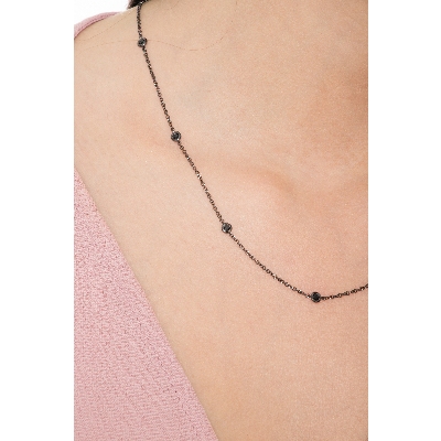 Collier en or bruni 18k sublimé par 9 diamants noirs