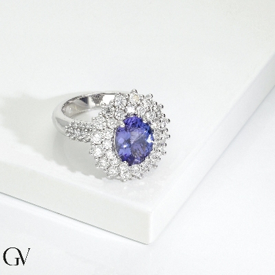 Bague halo en or blanc 18k avec tanzanite ovale 