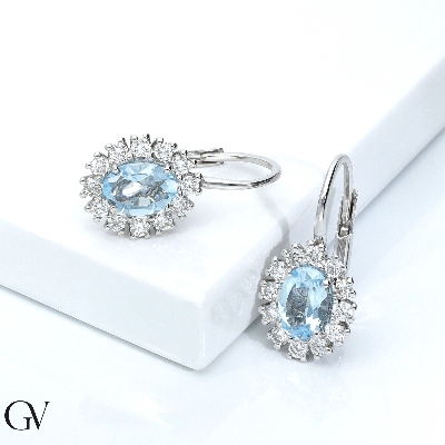 Boucles d'oreilles halo en or blanc 18k avec aigue-marine et diamants 