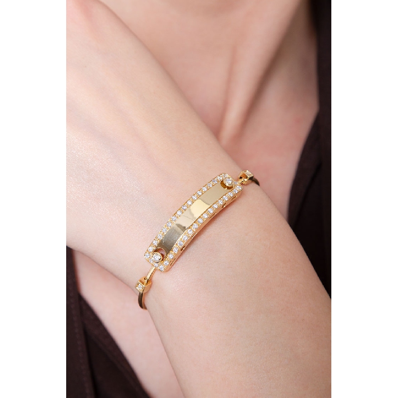 Bracelet avec plaque en or jaune 18 carats sertie de diamants Bracelet avec plaque en or jaune 18 carats sertie de diamants