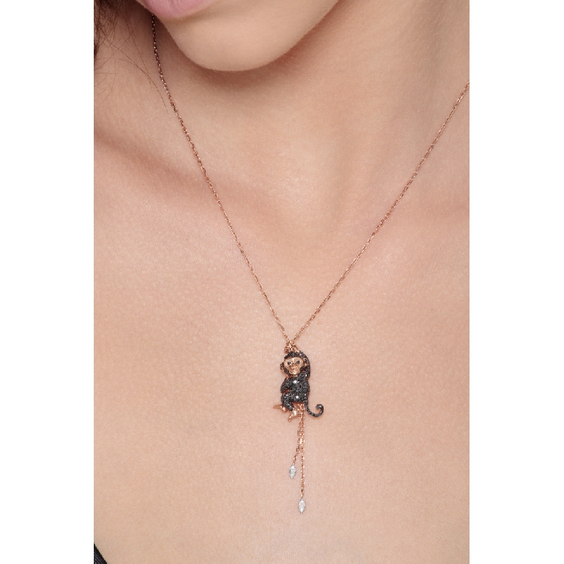 Collier en or blanc et rose 18k singe serti de diamants noirs Collier en or blanc et rose 18k singe serti de diamants noirs