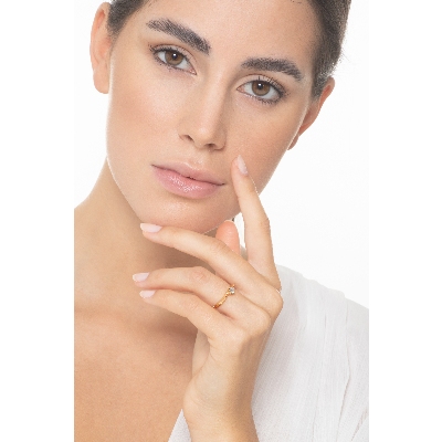 Solitaire à quatre griffes en or jaune 18 carats avec un diamant de 0,20 ct