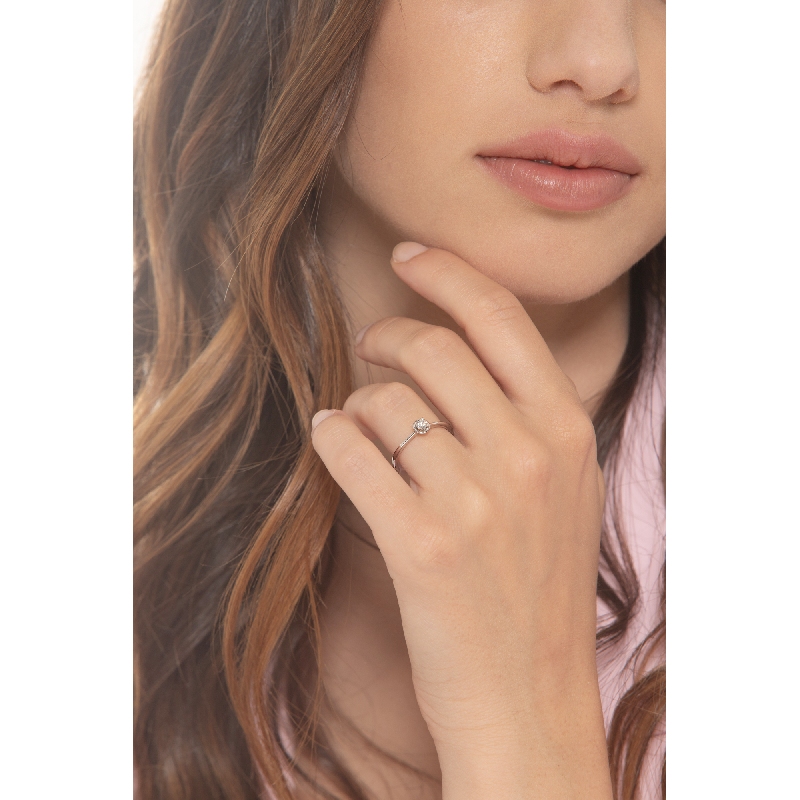 Bague solitaire diamant et or blanc 18k ,  ct. 0,15 Bague solitaire diamant et or blanc 18k ,  ct. 0,15