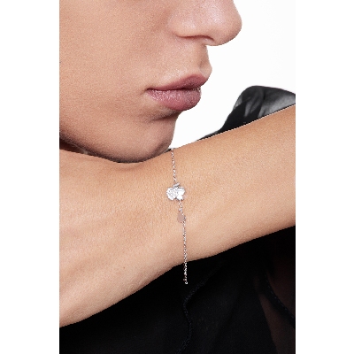 Bracelet symbolique or blanc 18 carats avec ange et zircons