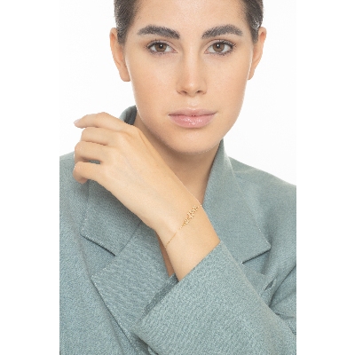 Bracelet en or jaune 18k trois fleurs 