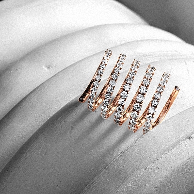 Bague à ressort en or rose 18 carats avec diamants