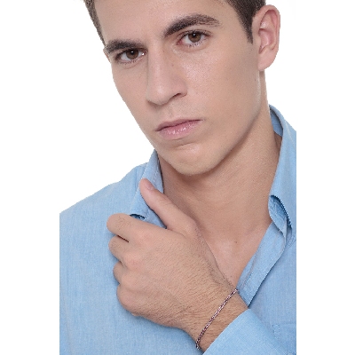 Bracelet tennis a griffes en or blanc 18k serti de rubis femme