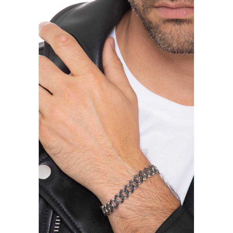 Bracelet groumette en or blanc 18k avec diamants noirs. Pointes brunies. Bracelet groumette en or blanc 18k avec diamants noirs. Pointes brunies.