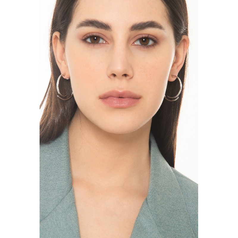 Créoles en or blanc 750 et diamants Créoles en or blanc 750 et diamants