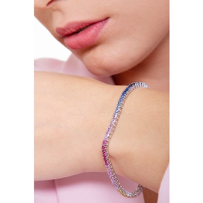 Bracelet Rivière en or blanc 18 carats avec saphirs multicolores.