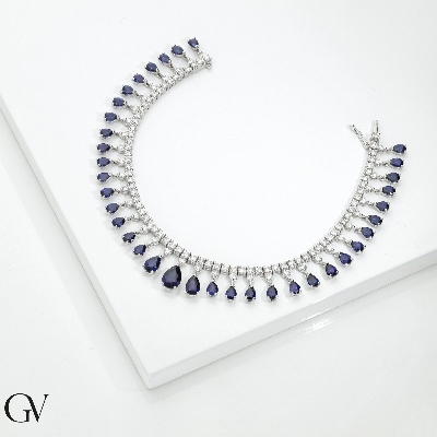 Bracelet tennis en design en or blanc 750 avec saphirs bleus et diamants