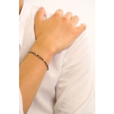 Bracelet Tennis griffes en or blanc 18k avec diamants noirs et blancs