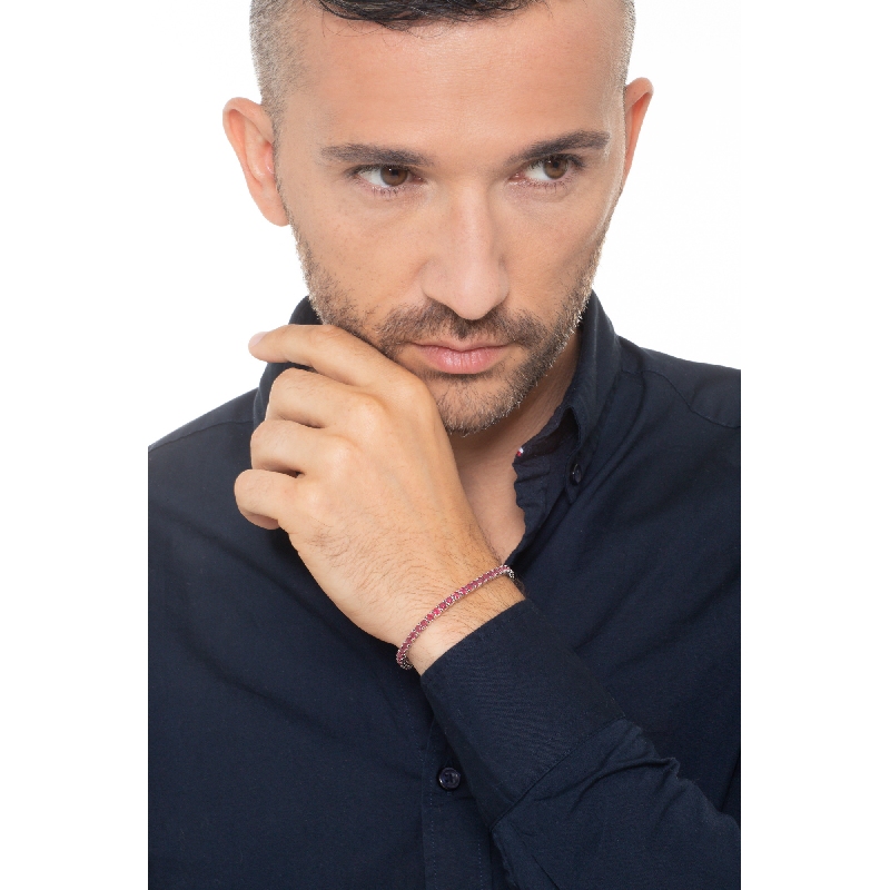 Bracelet tennis griffé en or blanc 18k serti de rubis  Bracelet tennis griffé en or blanc 18k serti de rubis