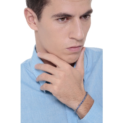 Bracelet tennis en or blanc 18k avec saphir bleu