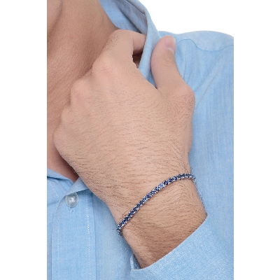 Bracelet tennis en or blanc 18k avec saphir bleu