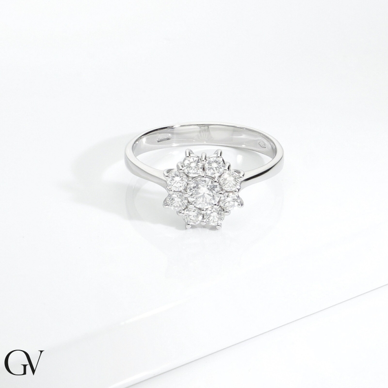 Bague halo en forme de fleur avec diamant central 0,25 Bague halo en forme de fleur avec diamant central 0,25