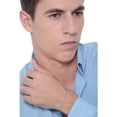 Bracelet tennis à griffes en or blanc 18k et diamants 