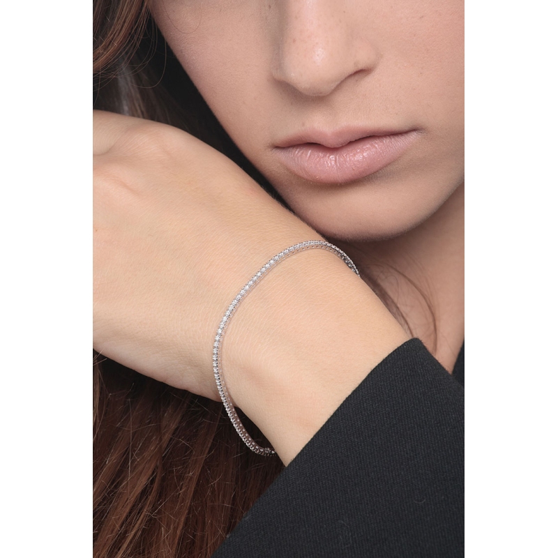 Bracelet tennis à griffes en or blanc 18k et diamants  Bracelet tennis à griffes en or blanc 18k et diamants