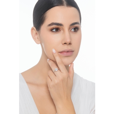 Bague halo en forme de fleur avec diamant central 0,25