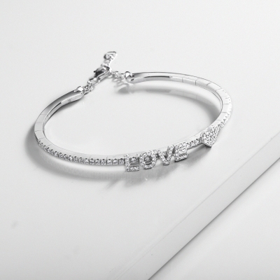 Bracelet rigide LOVE et diamants