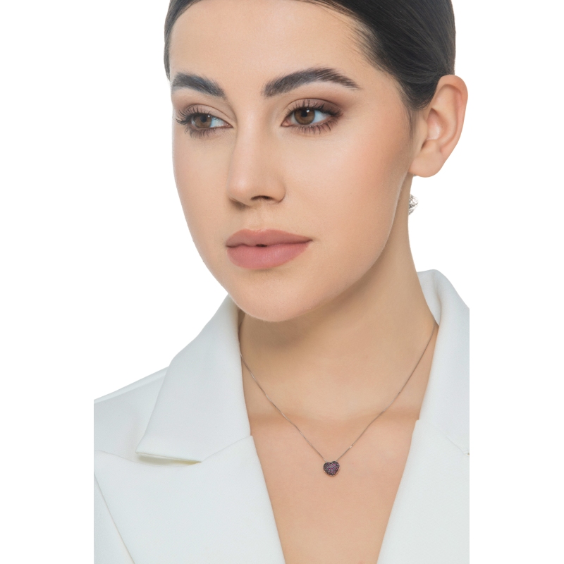 Collier en or blanc 750 cœur serti de rubis Collier en or blanc 750 cœur serti de rubis